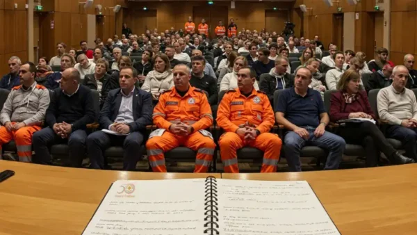 Pubblico ad una conferenza ripreso dal tavolo dei relatori
